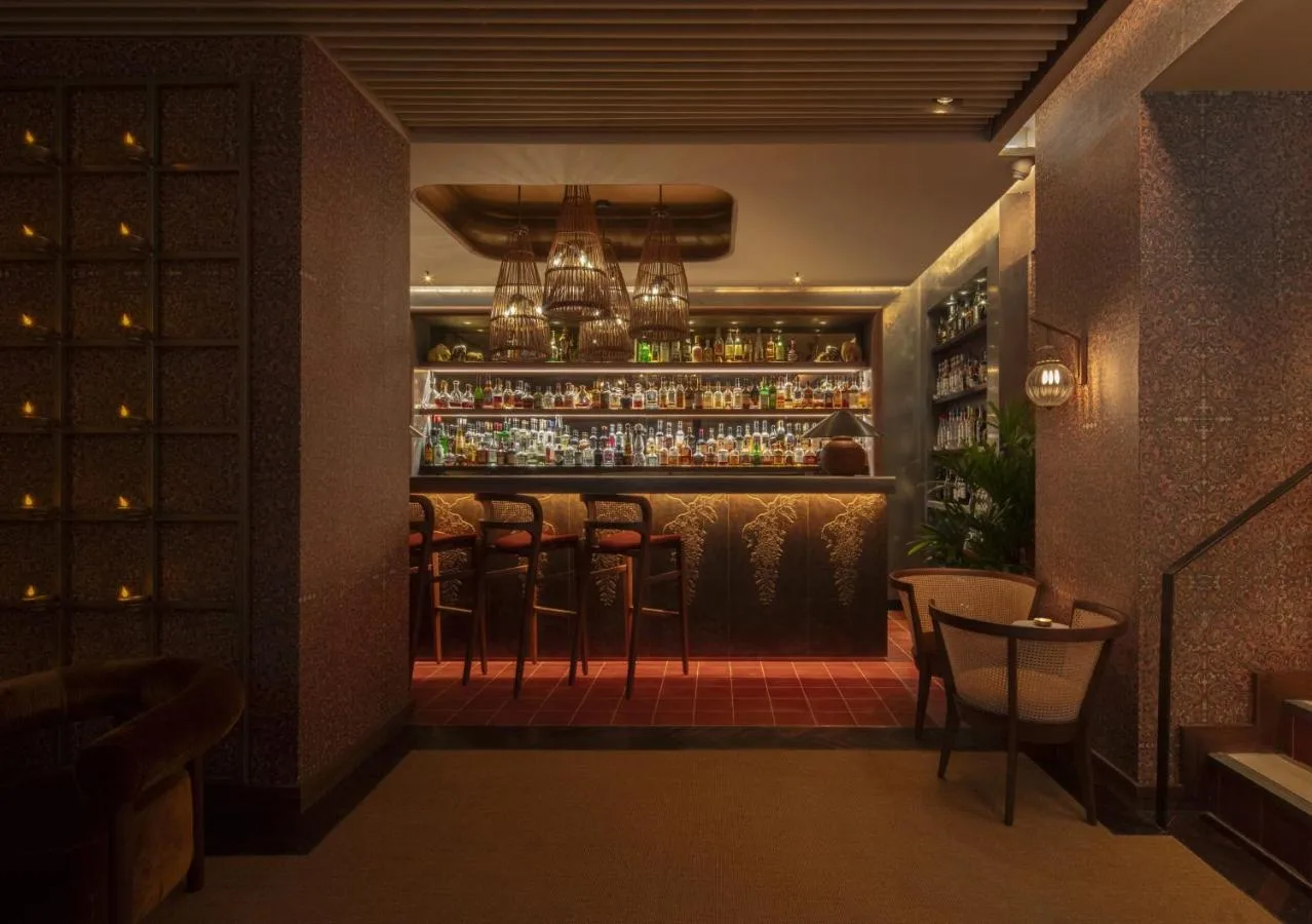 Restaurant with bar and stools at St. James' Court, A Taj Hotel, London