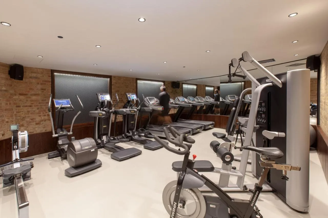 Gym with treadmills and cardio machines at St. James' Court, A Taj Hotel, London